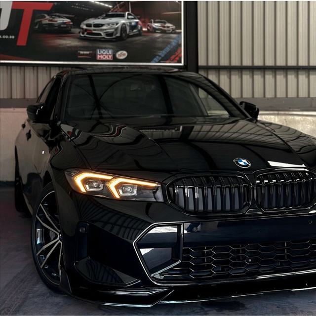 BMW G20 3 Series with amber DRL kit installed