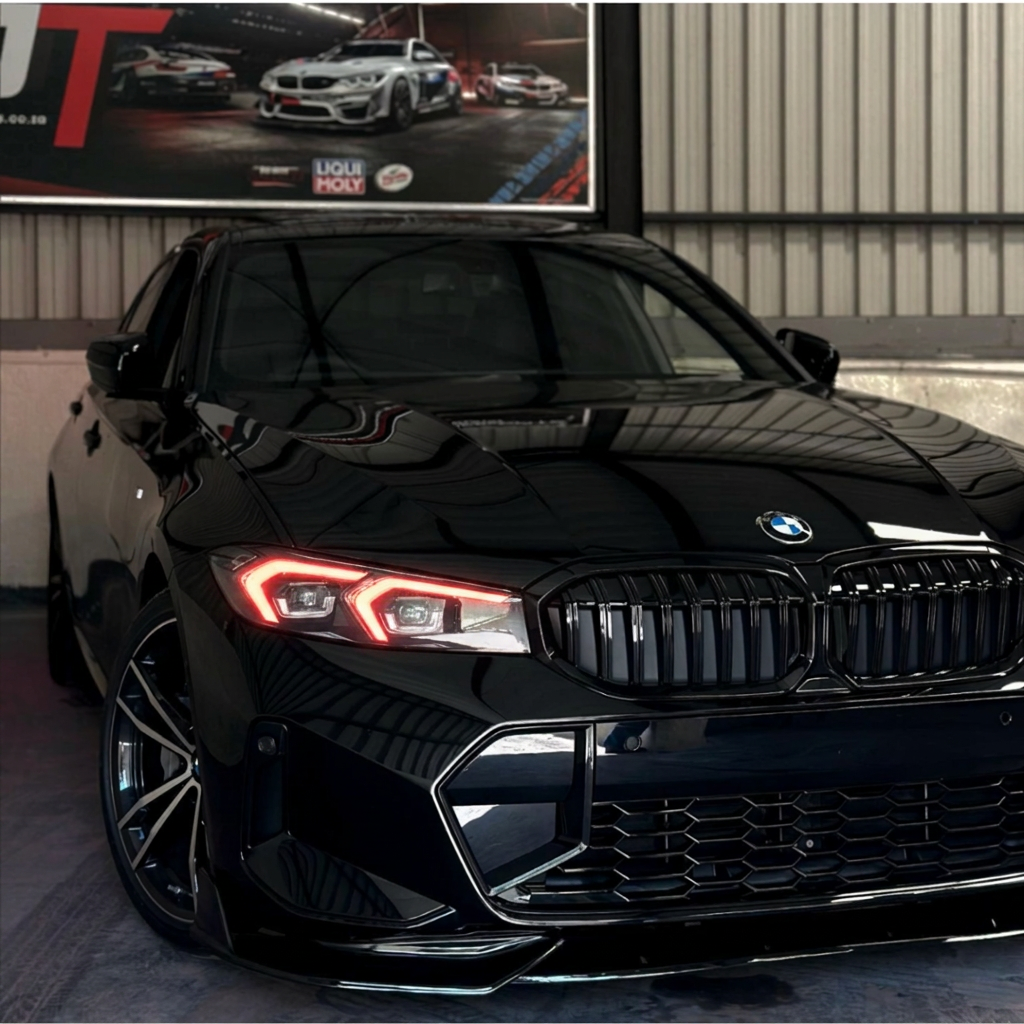 BMW G20 3 Series with red DRL kit installed