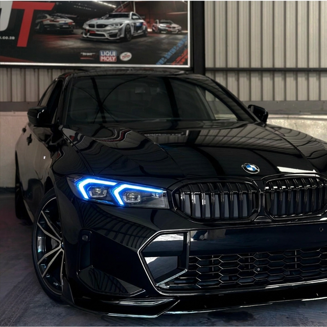 BMW G20 3 Series with blue DRL kit installed