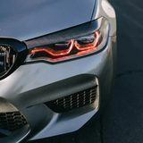 BMW G30 5 Series red DRL detail in sunlight