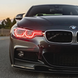 BMW F30 3 Series with red DRL kit installed - front view