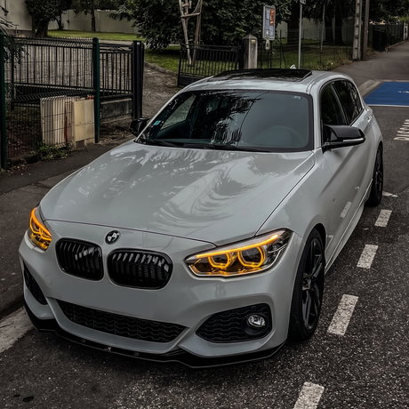 BMW F20 1 Series LCI with amber DRL kit installed