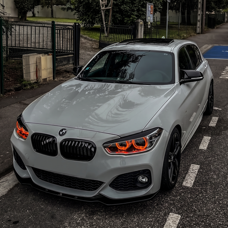 BMW F20 1 Series LCI with red DRL kit installed