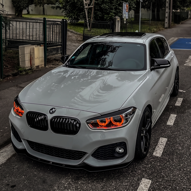 BMW F20 1 Series LCI with red DRL kit installed